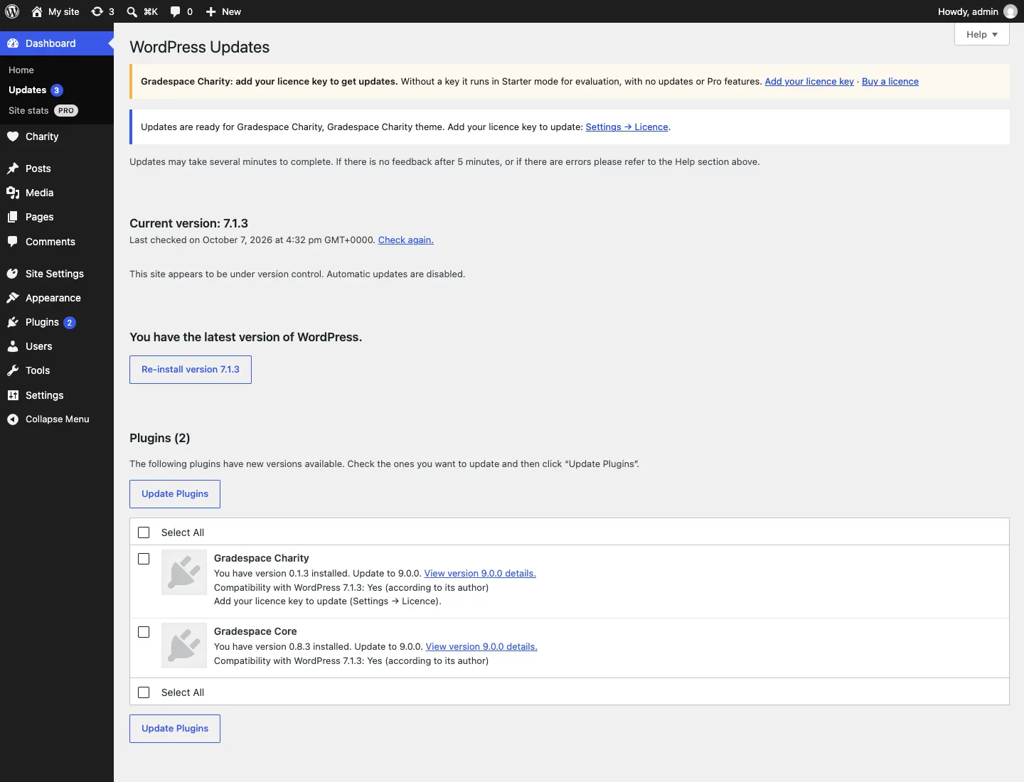 The Updates screen without a licence key, with the yellow notice "Gradespace Charity: add your licence key to get updates.", the notice "Updates are ready for Gradespace Charity, Gradespace Charity theme. Add your licence key to update: Settings → Licence." and "Add your licence key to update (Settings → Licence)." under Gradespace Charity