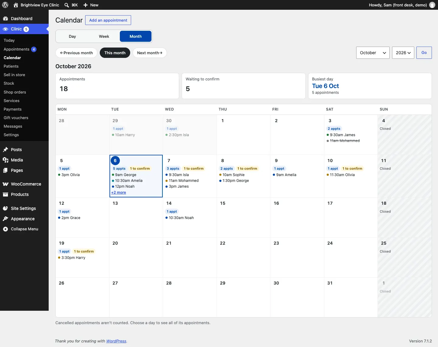 The Month view for October 2026, with each day showing a count such as 5 appts and 1 to confirm, the first few appointment times, and Sundays shaded as Closed